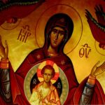 Icon of the Virgin Mary with Christ, halos and blessing gesture, flanked by red-winged angels on a gold backdrop